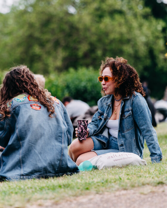 People sat in Alexandra Palace Park.